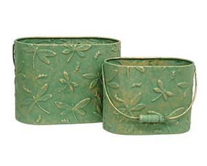 Dragonfly metal container set

These buckets are unique decorative accents crafted from metal with elegant, vintage-inspired style. Each bucket features an allover embossed dragonfly pattern and a rich green-copper finish. Wooden handle grips add a rustic touch to each bucket.

Materials:
Metal, wood

Dimensions:
Smaller bucket -
6" high x 4 1/4" deep x 8" wide

Larger bucket -
7 1/4" high x 5" deep x 9 3/4" wide