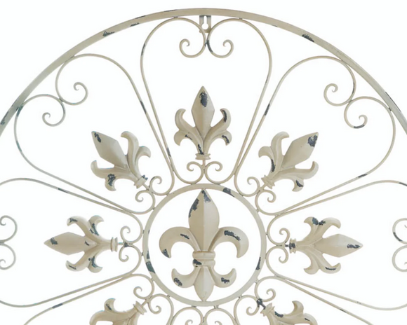 Circular Fleur-de-lis wall hanging

Decorate your home indoor or out with this sophisticated piece! This cool wall accent measures more than 2 feet in circumference and will have a big impact on the style of your room. It features French-inspired Fleur-de-lis symbols and heart-shaped scrolls that will bring an abundance of style to your bare wall. Use as a living room focal point, hallway ornament, or bedroom accent, this decorative wall decor will add an air of elegance to any space. 