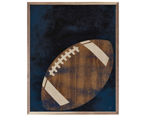 Rustic framed classic brown football wall art decor
*Made to order*

This unique piece is a simple way to bring beauty and charm to any wall in your home. It is made from high quality American hardwood planks with a hand painted face, and printed with UV cured ink, and is framed in a natural walnut frame. Each piece is unique with its own personality, marks, wood grain, and look. This would look beautiful in a bedroom or living room.&nbsp;

This piece is proudly made in the USA.