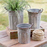 Whether used to store potting shed knick knacks or to display your favorite potted herbs, these pails are perfect for your country garden. Your purchase includes all three pails.  Materials: Metal  Dimensions: Smallest pail - 8 1/2" wide x 7" deep x 9" high&nbsp;