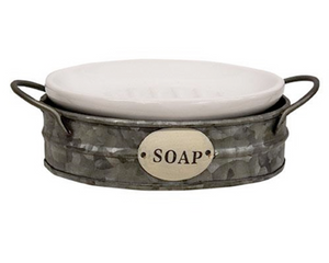 Galvanized metal countertop soap dish

This soap dish features a galvanized metal wash bin base and a removable enamel tray! The enamel is a clean, cream color and the wash bin is mildly distressed for an aged, rustic finish. It reads "soap" in black lettering across the bin and is perfect for use in a kitchen or bathroom.

Materials:
Metal, enamel

Dimensions:
4" wide x 1 1/2" deep x 7" long overall