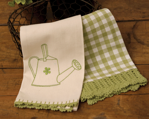 Green kitchen towel set

Whether displayed as part of your spring decor or used year round, these adorable towels are perfect for your kitchen. One towel features a watering can design, and the other has a buffalo check design.&nbsp;

Each set comprises one towel of each design.&nbsp;

Materials:
Cotton

Dimensions:
18" wide x 26" long

Care:
Machine washable&nbsp;