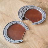 Our unique coasters will bring the essence of the wild west to your tables. Protect your surfaces from sweating drinks in style. Coasters are created with leather and aluminum horseshoes.