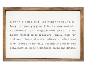 Large 'May This Home' framed wall decor
*Made to order*

This unique piece is a simple way to bring beauty and charm to any wall or shelf within the home. It is made from high quality American hardwood planks with a hand-painted face and is framed in a natural walnut frame. Each piece is unique with its own personality, marks, wood grain, and look. At 3 feet wide, this sign is sure to make a statement in your space.

This item is proudly made in the USA.

Materials:
Wood

Dimensions:
10" high x 16" wide