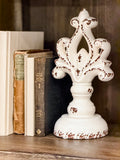 Decorative worn soft white ceramic finial pedestal