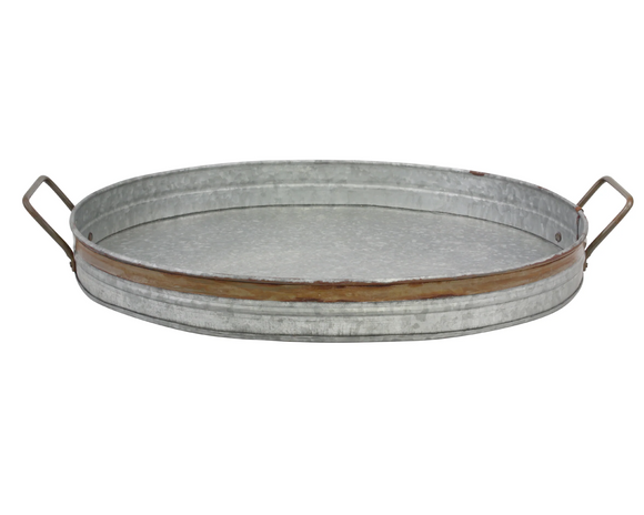 This rustic galvanized metal serving tray with rust trim is the perfect addition to any rustic home decor. Use the tray as a unique centerpiece for a coffee table or dining room setting. Add pillar candles or other decorative trinkets to create beautiful industrial wedding centerpieces. This decorative metal tray features a galvanized metal base with rust color trim that has been lightly distressed, giving a vintage feel and two sturdy metal handles.

Materials:
Galvanized metal

Dimensions:
14