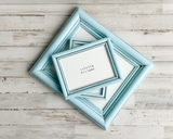  Add vintage style to an entryway or living room with a custom-made gallery picture frame set that complements almost any home decor, including coastal farmhouse and country cottage.

Every collection will include frames ranging in size from 5" x 7" photos to 11” x 14” pictures. All picture frame sets will include wood frames that have simple, classic designs, as shown above in the example photos. Your frames will come with glass, newly installed mounting hardware, acid-free backing, and hanging hardware al