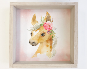 This is the perfect piece for a kid's room or nursery! The soft colors make this a great addition to any room. Printed with high resolution archival giclee inks on a fine art cotton wood-mounted canvas, this print is whimsical yet fun. It's also a great choice for a baby shower gift.&nbsp;  This item is proudly made in the USA. Materials: Wood, canvas  Dimensions: 6" wide x 1" deep x 6" tall