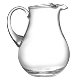 Clear glass pitcher on a white background