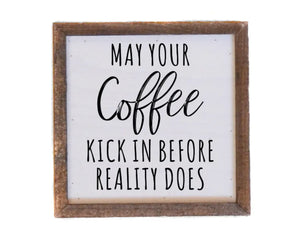 'May Your Coffee Kick In' rustic wood sign&nbsp;

Add a humorous touch to your kitchen with this rustic wood sign. It is made using a wooden box frame. This sign may be hung directly off the frame or will stand up right on a table or shelf.&nbsp;

Materials:
Wood

Dimensions:&nbsp;
6" wide x 2" deep x 6" high