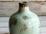 Light green miniature bud vase

This sweet miniature vase is the ideal choice for any area needing a little extra appeal. Its smooth glossy finish catches the eye. This beautiful piece of ceramic art makes a great gift.

Materials:
Ceramic

Dimensions:
3" diameter x 5" high

Care:
Clean with soft cloth
