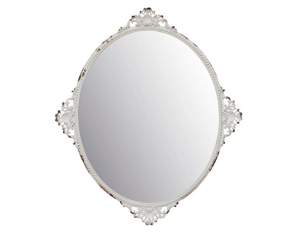 This small antique-inspired pieces features an oval glass mirror accented with a lightly distressed white metal frame with rust detail. This decorative metal mirror comes with 4 small feet for tabletop use and an attached metal hanger for hanging wall display. <br>