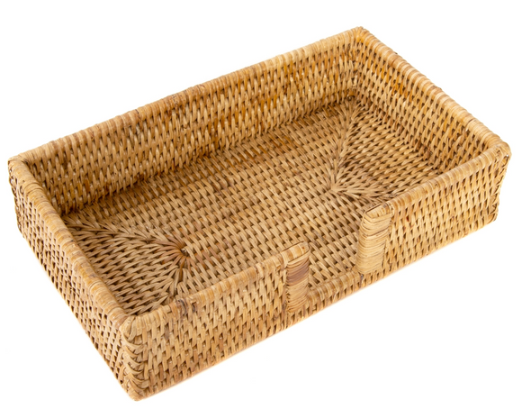 Woven rattan pet bed on a white background