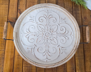 Round off-white wood and metal tray

This off-white, wooden tray boasts an everyday, year-round appeal that effortlessly enhances any interior design. With its practical metal handles, this decorative tray is not just a piece of decor, but a testament to comfortable, chic living. Ideal for any kitchen or tabletop setting, it uniquely reflects your personality and lifestyle.

Materials:
Wood, metal

Dimensions:
16 1/4" diameter tray
20" wide with handles
