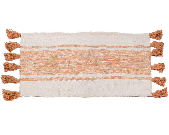 Modern farmhouse orange striped accent mat

Whether used in a half-bath or as an entryway rug, this adorable mat is perfect for adding a pop of color to your space. It features a neutral beige background and orange stripes along the center. The shortest ends of the rug are accented with matching orange tassels. 

Materials:
Cotton blend

Dimensions:
24