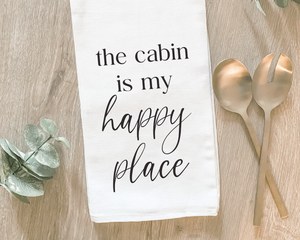 White 'The Cabin Is My Happy Place' kitchen towel
*Made to order*

Our cotton tea towels are heavy-weight, highly absorbent, and lint-free. This design features the phrase the "The cabin is my happy place" printed with water-based ink atop a white background. These are perfect for year-round use and make for a great gift.

This item is proudly made in the USA.&nbsp;

Materials:
Cotton

Dimensions:
27" wide x 27" long

Care:
Machine-washable, tumble try&nbsp;
