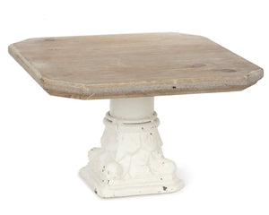 Whitewashed pedestal stand with ornate detailing  Whether used to display decorative pieces or as a cake stand, this gorgeous pieces is perfect for your shabby home. The base features a distressed white finish that is topped with a whitewashed tray. Pictures do not do this justice.  Materials: MDF, resin  Dimensions: 6" high x 9" wide