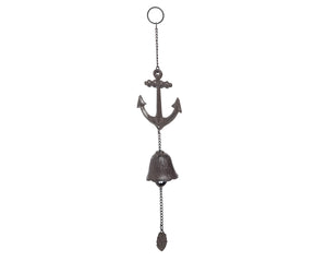 Decorative metal anchor with bell wind chime on a white background