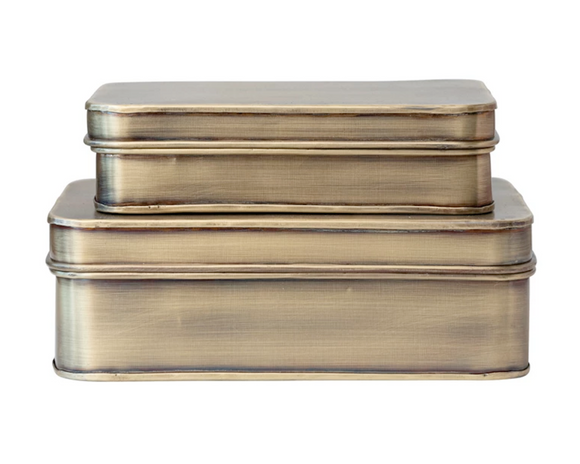 Set of 2 antique brass metal boxes

Store small papers or other office supplies in these attractive metal boxes. Each one features an antique brass finish with matching lid. Your purchase comprises one box of each size.

Materials:
Metal

Dimensions:
Smaller box -
4 3/4