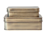 Set of 2 antique brass metal boxes

Store small papers or other office supplies in these attractive metal boxes. Each one features an antique brass finish with matching lid. Your purchase comprises one box of each size.

Materials:
Metal

Dimensions:
Smaller box -
4 3/4" wide x 2 1/4" high x 8 1/4" long

Larger box -
6" wide x 3" high x 10" long