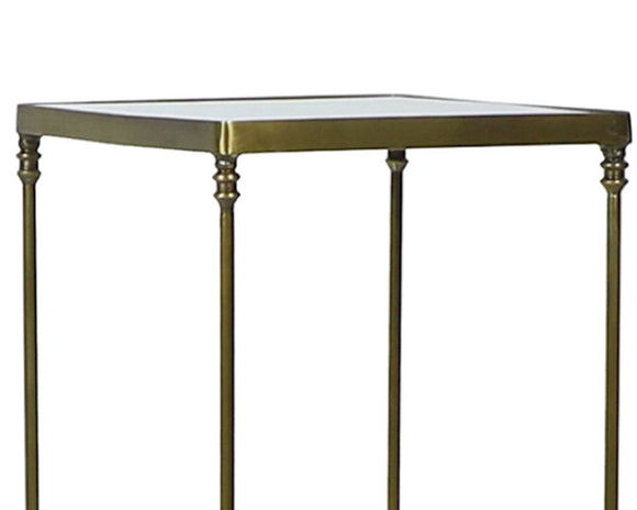 Antique brass side table with glass top

Refined and airy, this table is square with both upper and lower shelves. The table has an antique brass frame and features antiqued glass on both upper and lower shelves. This is a perfect piece for a small bedroom or hallway.

Materials:
Metal, glass

Dimensions:
12