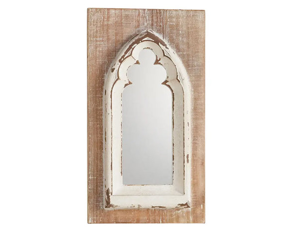 Distressed arched mirror on wood plank