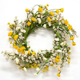 This candle ring is a decorative floral piece with a green-wrapped base. It is perfect to use as a candle ring around a larger pillar candle or as a miniature wreath. The ring as soft, foamy greenery and features cream and yellow astilbe buds alongside layered cream and yellow blooms. This ring brings a bright and cheerful touch to the home during the spring and seasons. They would also work well as wedding decorations.

Materials:
Foam, fabric, wire

Dimensions:
6 1/2" inside diameter&nbsp;
12" outside dia
