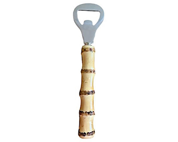 Bamboo wood bottle opener

Add some pizzazz to your bar cart with this bottle opener that features a bamboo handle. It's perfect for effortlessly popping open a bottle, and it makes a delightful gift topper for your favorite hostess! 

Materials:
Wood, stainless steel

Dimensions:
1 /12