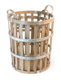 Wooden basket with metal bands on a white background