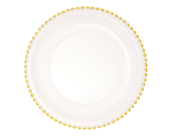 White plate with gold beaded rim on a white background