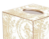 Traditional beige &amp; gold toile wooden tissue box cover

This beige toile decoupage tissue box cover is handmade to order by a wonderful team in Houston. They easily slide over any cubed tissue box cover. The artwork is hand-cut, decoupaged, and polished. Each tissue box cover is hand-painted in gold around the edges as the finishing touch.

This item is proudly made in the USA.

Materials:
Wood

Dimensions:
5" wide x 5" deep x 5 1/4" high