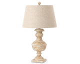 Table lamp with beige shade and wooden base on a white background