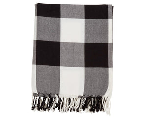 Black &amp; white buffalo check throw blanket

This cotton throw blanket adds classic style and rustic charm to any space. Featuring a traditional buffalo plaid pattern and tassel-trimmed edges, it's perfect for any season and cozy corners.

Materials:
100% Cotton

Dimensions:
50" wide x 60" long

Care:
Machine washable