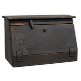 Black wooden bread box

This bread box is an attractive, functional container with a black painted finish and distressed detailing. It is wood with a flat bottom for display on tabletops, counters, and other flat surfaces, and it has an easy open lid with a latch for locking. This box makes a great addition to a kitchen countertop.

It is proudly made in the USA.

Materials:
Wood, metal

Dimensions:
11" high x 8" deep x 16 1/2" wide
