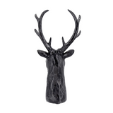 Black deer head wall decoration on a white background
