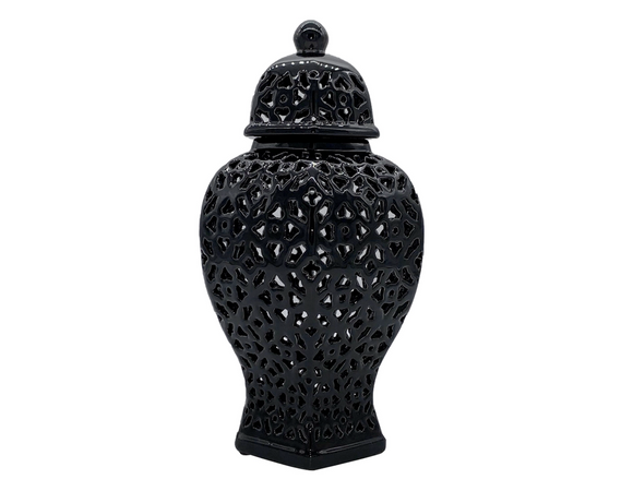 Black decorative vase with intricate lattice design on a white background