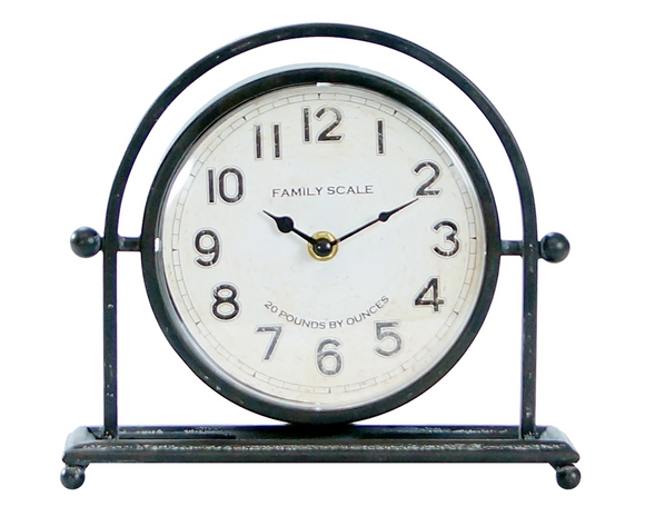 Introduce a touch of elegance to your home with this long and narrow iron table clock. It adds a touch of vintage charm to any space. Its design blends perfectly with modern farmhouse, industrial, or salvaged styles. Whether you're accenting your home office or adding character to your living room, this clock is perfect for your space.
