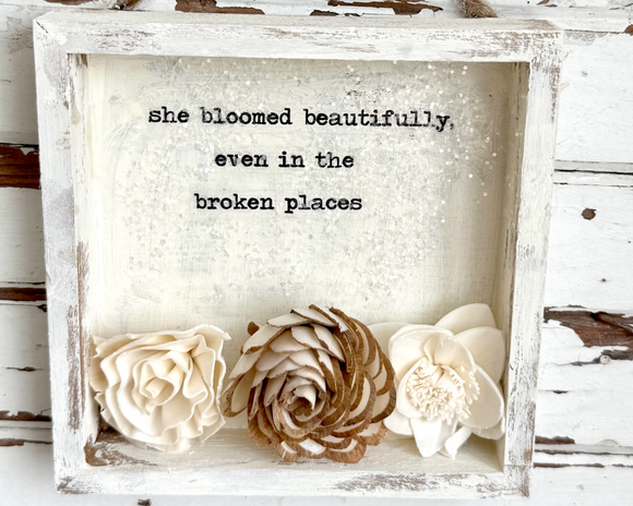 Floral wood shadowbox

Add charm and inspiration to your shop’s shelves with this handcrafted floral wood shadowbox, a perfect accent for any home decor collection. Each shadowbox is lovingly handmade with high-quality wood and features a hand-painted background with a warm, rustic finish. The heartfelt statement, 