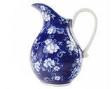 Royal blue floral garden stoneware pitcher

Elegant and sophisticated, this pretty pitcher is lovingly painted by hand with every attention paid to detail and quality. While playing on classic sensibilities of blue and white innate to Chinese ceramics, this pitcher brings the trend into the modern era with its scalloped sturdy stoneware body and playful floral pattern.

Materials:
Stoneware

Dimensions:
8 3/4" wide x 7 1/4" deep x 10" high

Care:
Hand-wash only