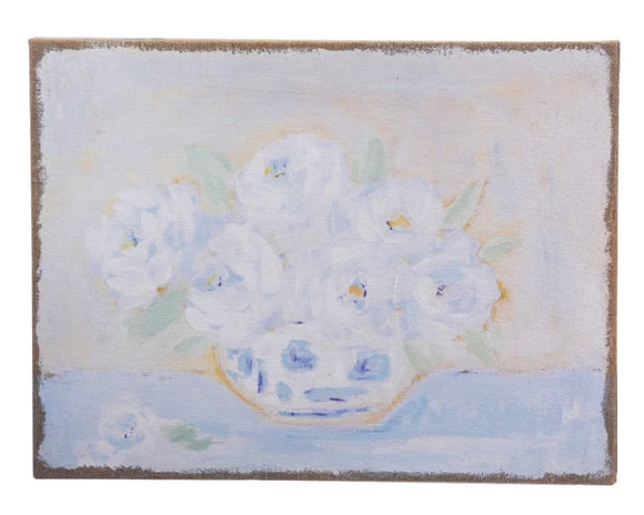 Add classic charm to a guest room with this lovely wall hanging. It features a blue floral print that has been plastered onto a burlap backing. This piece would also work well in a nursery or bedroom. And it makes for a great gift.

Materials:
Burlap

Dimensions:
18
