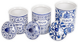Set of blue and white ceramic canisters with labels for coffee, sugar, and flour.