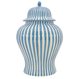Blue and white striped ceramic jar with lid on a white background