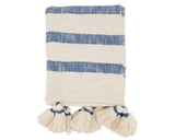 Striped towel with tassels on a white background