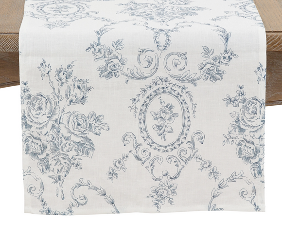 Traditional blue & white floral toile table runner

This table runner is perfect for hosting or special occasions, as it brings a delicate, refined touch to your table decor. While rich and adorning, the blue and white floral toile pattern is soft and adds beautiful texture to the tabletop. Pair this with coordinating napkins to make the design pop. 

Materials:
100% Linen

Dimensions:
16