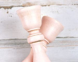 Set of 2 blush pink wooden candlesticks for the home&nbsp;
*Made to order*

If you’re looking for shabby cottage chic dining table decorations or shelf decor, look no further! These two hand-painted, wood candle holders complement almost any home or dining room decor, including shabby cottage chic, farmhouse chic, and even traditional. Place several of these candlesticks in a group on a dining room table for centerpiece or on a mantel in a living room for a vintage-inspired candlescape.

These candle holder