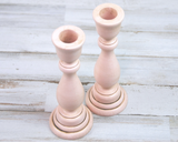 Set of 2 blush pink wooden candlesticks for the home&nbsp;
*Made to order*

If you’re looking for shabby cottage chic dining table decorations or shelf decor, look no further! These two hand-painted, wood candle holders complement almost any home or dining room decor, including shabby cottage chic, farmhouse chic, and even traditional. Place several of these candlesticks in a group on a dining room table for centerpiece or on a mantel in a living room for a vintage-inspired candlescape.