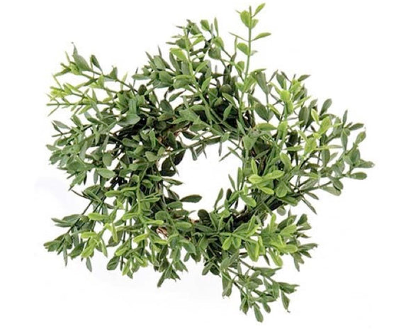 This artificial boxwood candle ring is an easy way to add a touch of greenery to your everyday decor. It features neutral green boxwood stems on a twig ring base. These candle rings are great for year-round use or the holidays.

Materials:
Plastic, wood

Dimensions:
2
