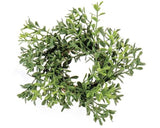 This artificial boxwood candle ring is an easy way to add a touch of greenery to your everyday decor. It features neutral green boxwood stems on a twig ring base. These candle rings are great for year-round use or the holidays.

Materials:
Plastic, wood

Dimensions:
2" inside diameter
6" outside diameter