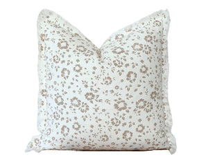 Brown floral throw pillow with fringe edging

This pillow brings timeless elegance and cozy charm to any space. With soft white, cream, taupe, and beige tones, this pillow features a delicate floral pattern paired with textured details and frayed edges. Perfect for layering on beds, couches, or chairs, these pillows add sophistication to any decor. Crafted from high-quality materials, this collection is both durable and stylish. 