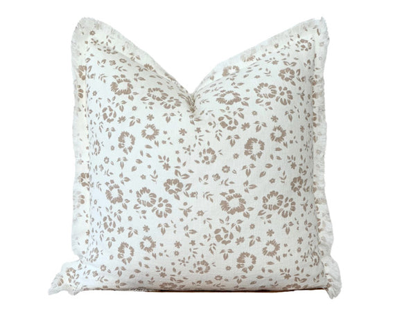 Brown floral throw pillow with fringe edging

This pillow brings timeless elegance and cozy charm to any space. With soft white, cream, taupe, and beige tones, this pillow features a delicate floral pattern paired with textured details and frayed edges. Perfect for layering on beds, couches, or chairs, these pillows add sophistication to any decor. Crafted from high-quality materials, this collection is both durable and stylish. 